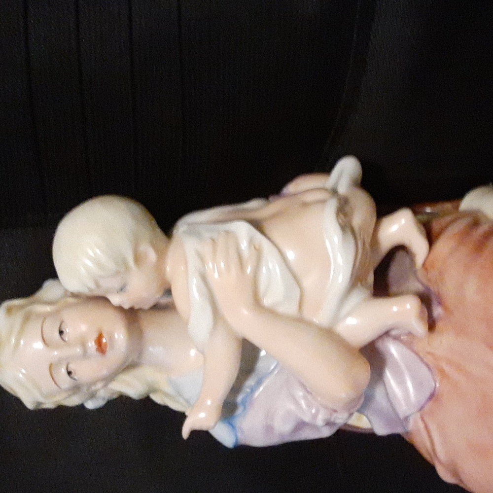 Epoch handpainted porcelain figurine.  About 8 inches  (Vintage)